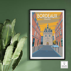Bordeaux poster print showcasing vintage travel art of France, framed in a stylish setting with green foliage.