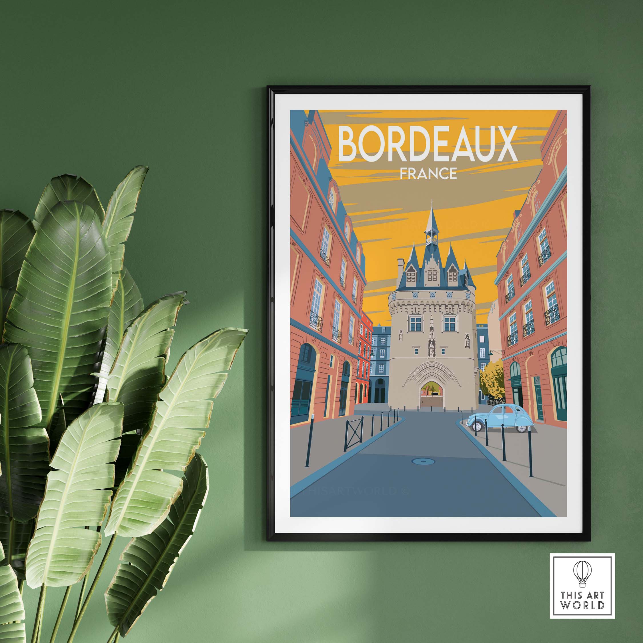 Bordeaux poster print showcasing vintage travel art of France, framed in a stylish setting with green foliage.
