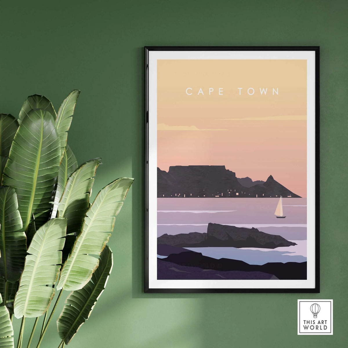 Cape Town Print Wall Art Poster displayed in a stylish frame on a green wall, showcasing vintage travel design.