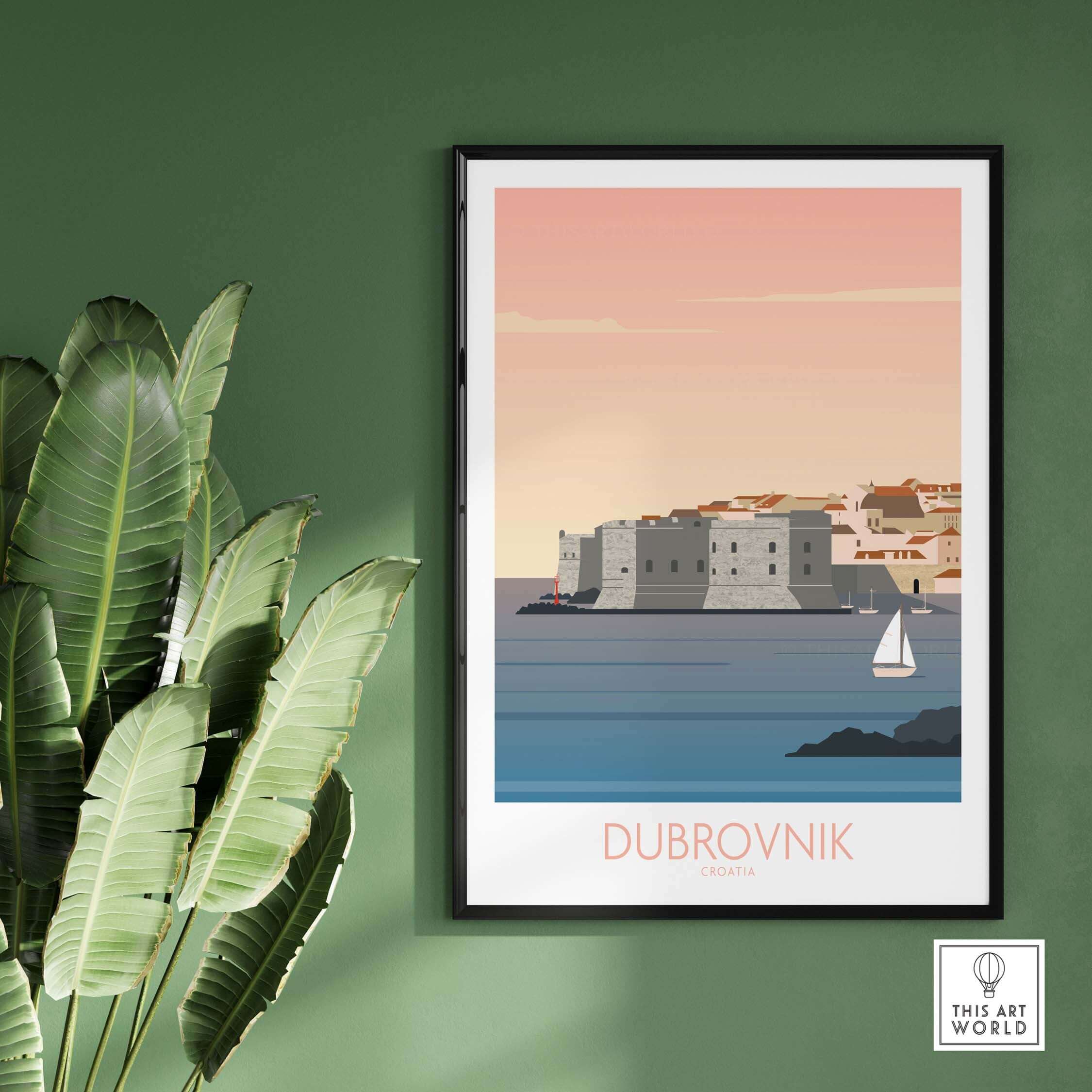 Framed Dubrovnik print travel poster showcasing coastal scenery and sailboat on green wall.