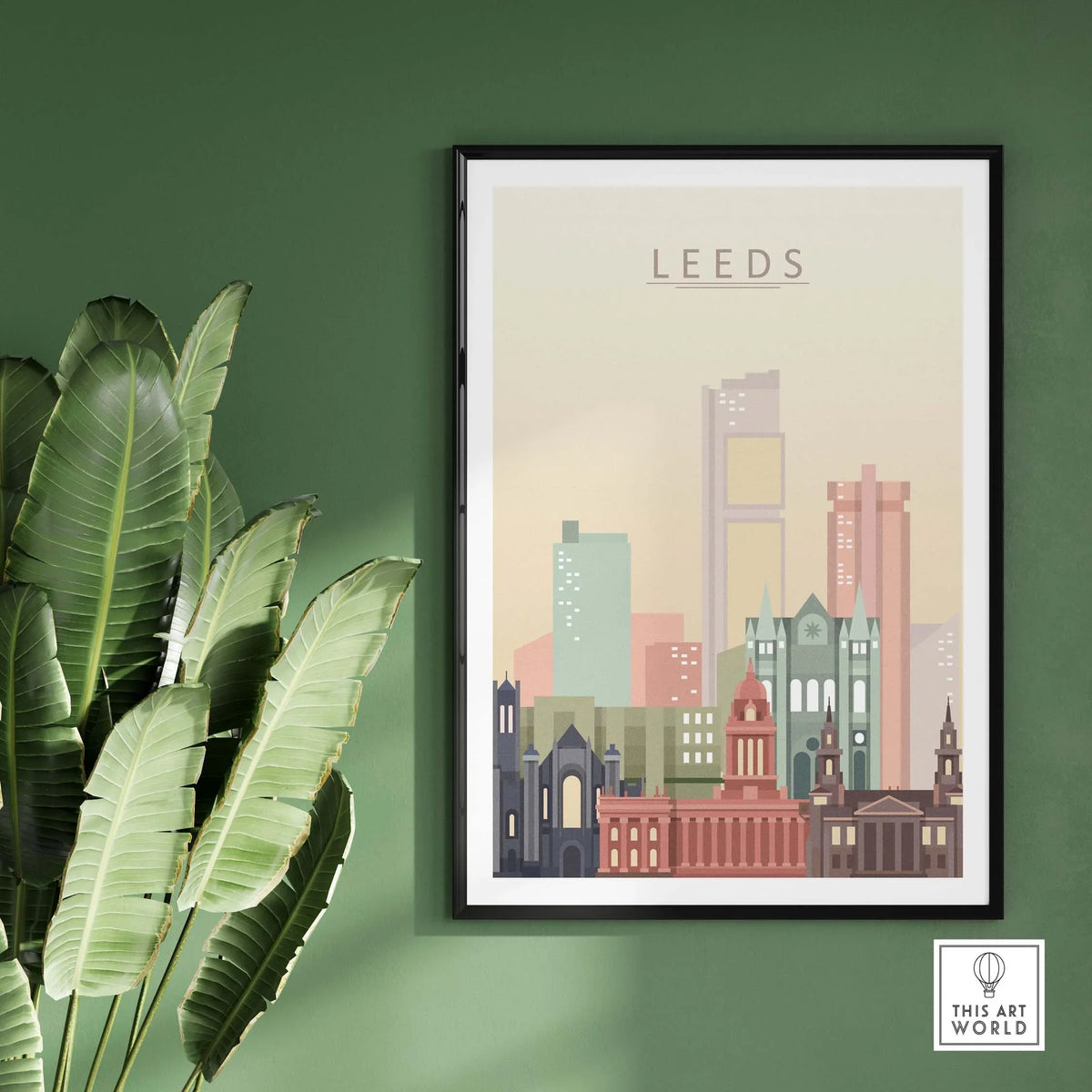 Framed Leeds Print Skyline Wall Art featuring stylish pastel cityscape on a green wall.
