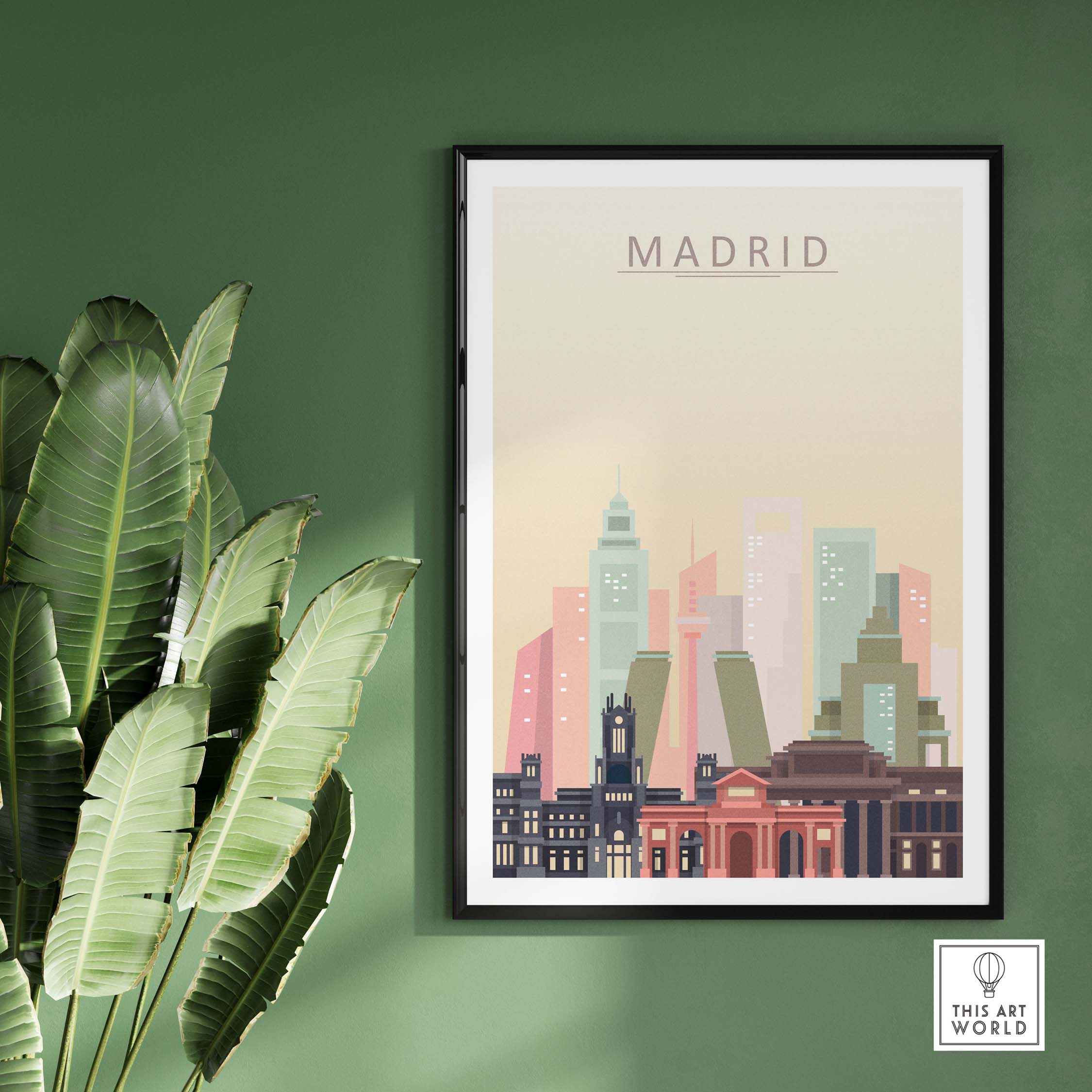Madrid skyline print featuring iconic architecture in warm pastel tones, framed on green wall with plants.