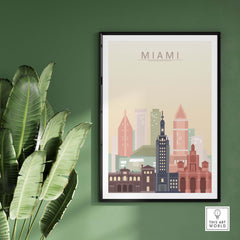 Miami Skyline Wall Art Print in pastel colors, framed on green wall, showcasing iconic city architecture.