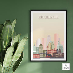 Rochester Skyline Wall Art Print framed on a green wall, showcasing iconic buildings in pastel tones.