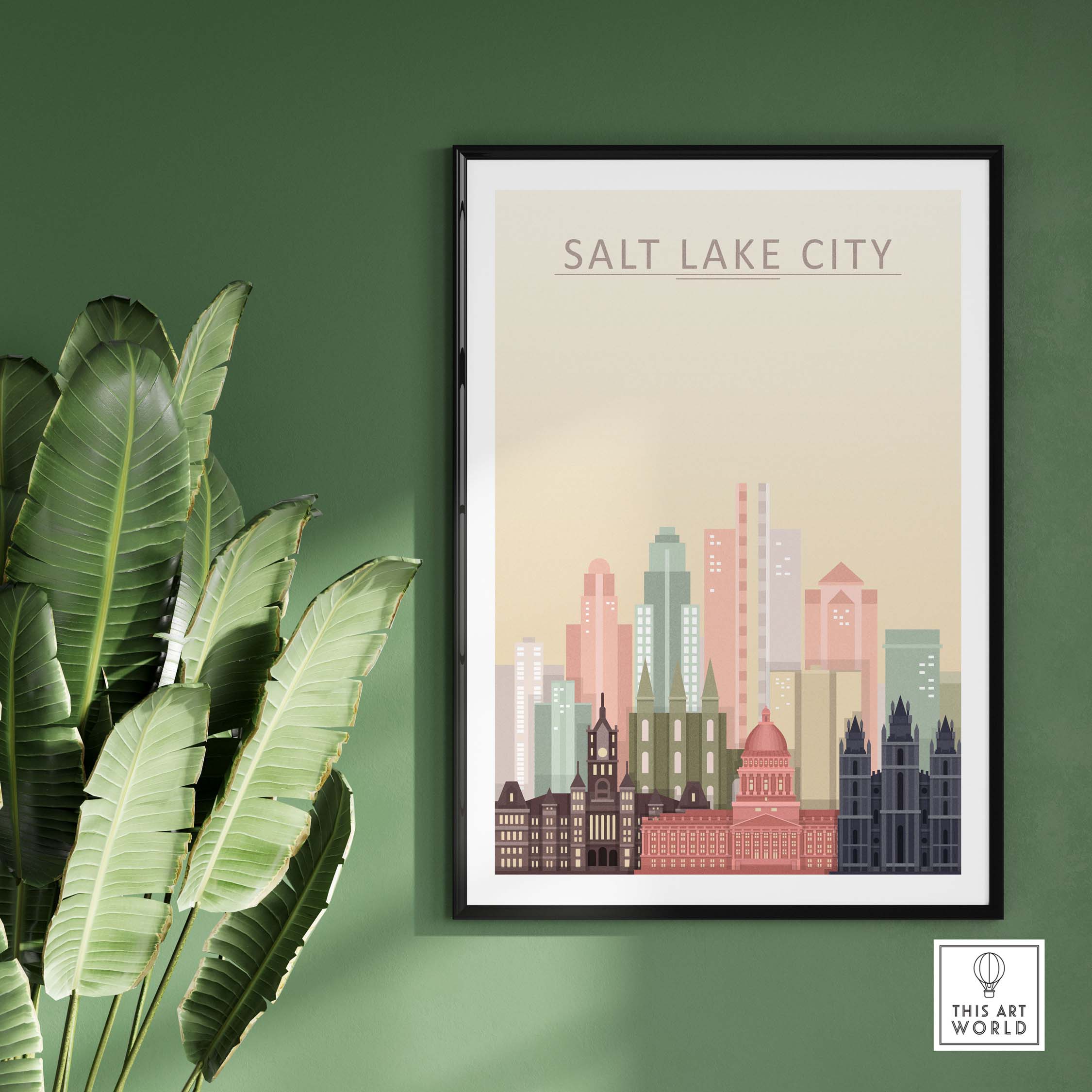Salt Lake City skyline wall art print framed against a green wall, showcasing iconic buildings in pastel tones.