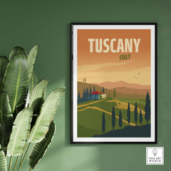 Tuscany poster wall art print featuring a scenic landscape, framed against a green wall with tropical plants.