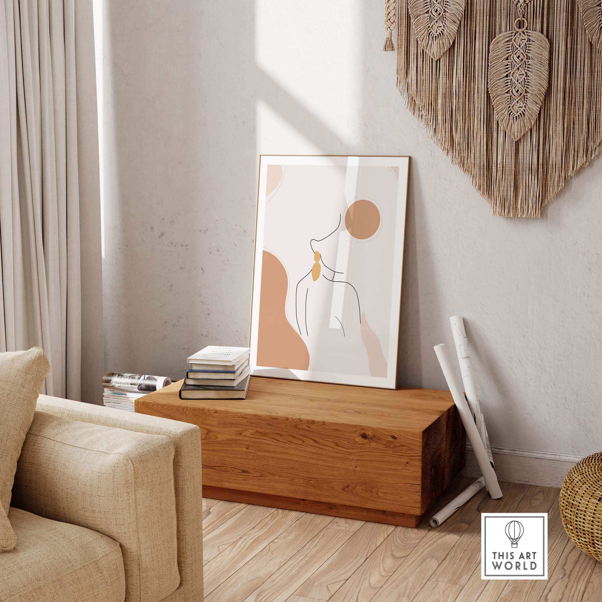 Abstract female outline print displayed in a modern living room setting with wooden decor.