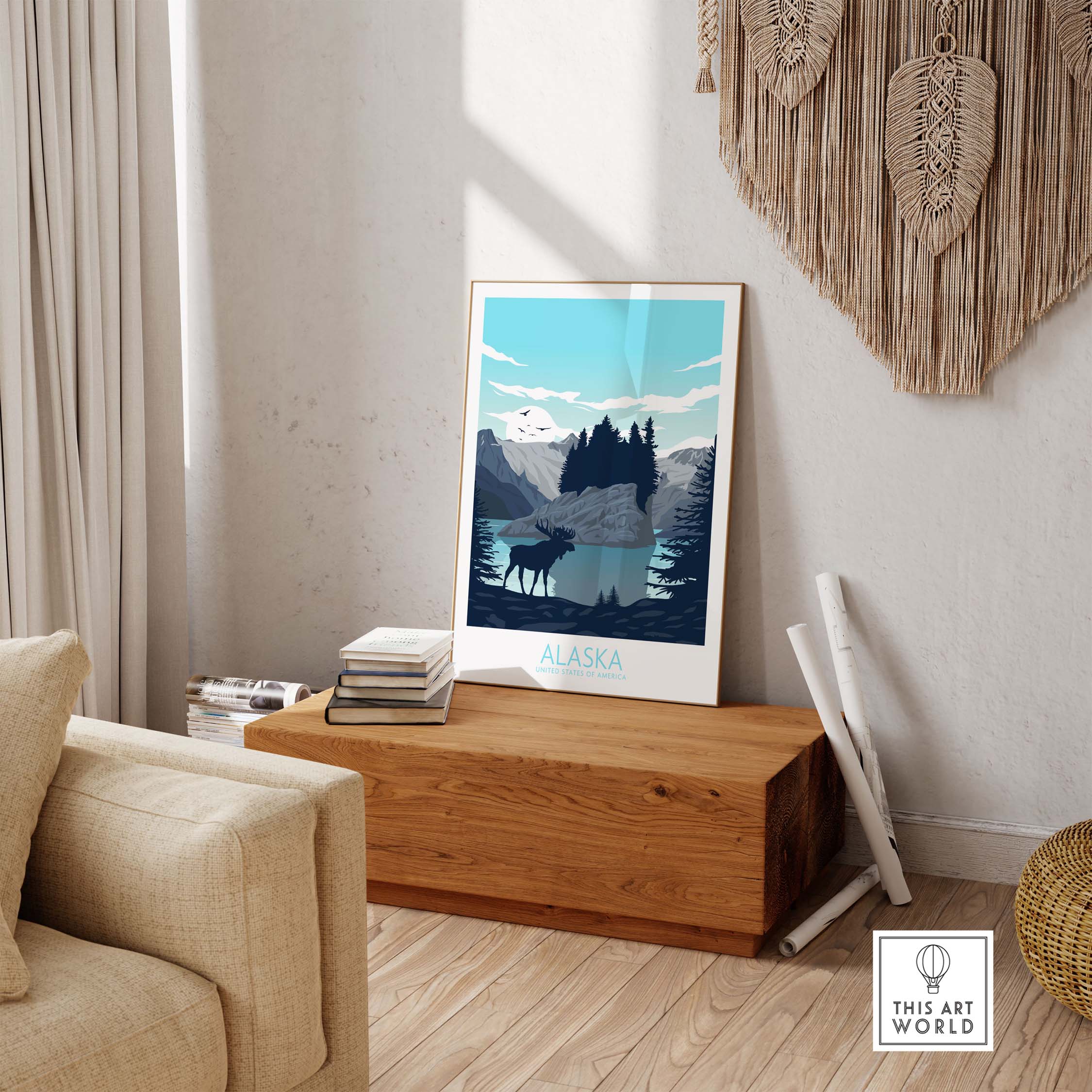 Alaska print travel poster displayed in a cozy living room setting, featuring mountains and wildlife.