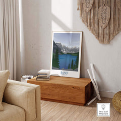 Banff National Park art print featuring mountains and lake, styled in a minimalist design, in a cozy living room.