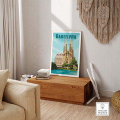 Vintage Barcelona print poster featuring Sagrada Familia, styled in a cozy living room setting.