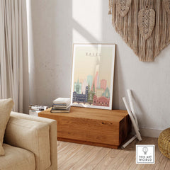 Basel City Skyline Wall Art Print displayed in a modern living room with pastel colors and vibrant architectural design.