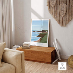 Cornwall poster print displayed in a stylish living room setting, showcasing coastal scenery and vintage travel aesthetic.