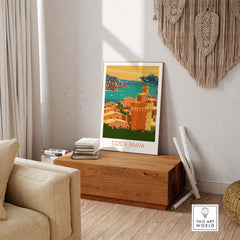 Costa Brava poster showcasing a minimalist design of Spain's coastline and architecture, ideal for home or office decor.