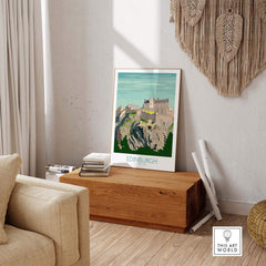 Edinburgh travel poster with castle design displayed in a stylish home setting, perfect for decor and wanderlust inspiration.