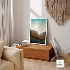 Glencoe National Park print featuring stunning mountain scenery, displayed in a cozy indoor setting.