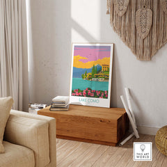 Lake Como Italy poster displayed in a modern living room, featuring vibrant colors and minimalist design.