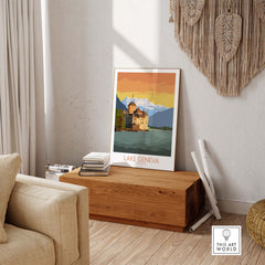Lake Geneva art print poster displayed in a stylish living space with natural decor and wooden accents.
