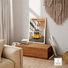 Vintage Lisbon Print Poster Wall Art showcasing a yellow tram, perfect for travel enthusiasts and stylish home decor.