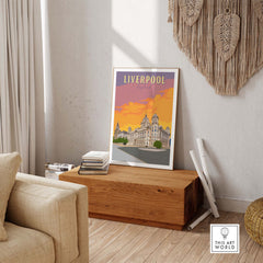 Liverpool vintage travel poster displayed on a wooden table in a stylish home setting, showcasing English architecture.