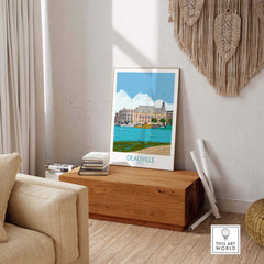 Deauville travel poster print displayed in a stylish living room, capturing vintage travel nostalgia with minimalist design.