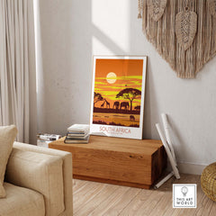 South Africa print featuring Kruger National Park, showcasing wildlife and sunset, displayed in a stylish home setting.