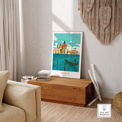 Venice Italy poster print displayed in a stylish living room, showcasing vintage travel art inspired by gondolas.