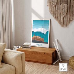 Nazare Wall Art Print displayed in a minimalist living room, showcasing Portugal-inspired design and vintage travel style.