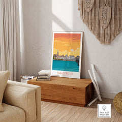 Stylish Maastricht travel poster showcased in a cozy interior, evoking wanderlust and vintage charm.
