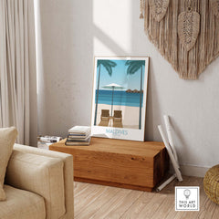 Vintage-style print of Maldives with beach chairs and palm trees, perfect for travel enthusiasts and home decor.