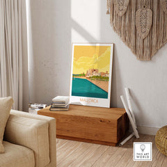 Mallorca travel poster featuring vintage design and vibrant colors, displayed in a stylish home setting.