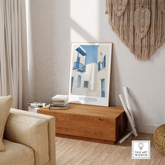 Mykonos wall art print showcasing vintage travel design in a stylish living room setting.