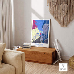 Mykonos Print Travel Poster on display in a stylish living room, capturing the essence of wanderlust and vintage travel art.