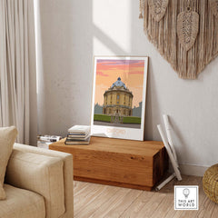 Stylish Oxford travel poster displayed in a modern living room, showcasing vintage-inspired artwork for home decor.