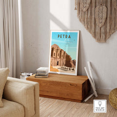 Petra travel poster print styled in a minimalist living room showing the iconic architecture of Petra, Jordan.