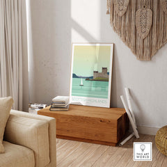 Scottish Highlands art print displayed in a modern living room setting, featuring a serene landscape and vintage design.