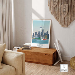 Seattle poster print displayed in a stylish living room, showcasing iconic Seattle skyline and vintage travel art.