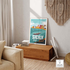 Sicily wall art print in a cozy living room setting, showcasing vintage-inspired travel design.