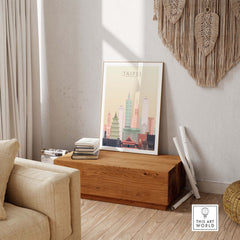 Taipei City skyline wall art print in warm pastel tones displayed in a cozy living room setting.