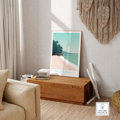 Philippines print travel poster displayed in a cozy living room, capturing the essence of tropical beach vibes.
