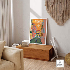 Vintage-inspired Venice Italy poster print wall art displayed in a stylish living room setting.