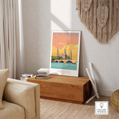 Zaragoza Spain poster displayed in a stylish living room with natural decor and wooden furniture.