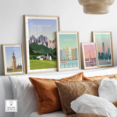Dolomites Travel Poster Print displayed in a stylish living room with other city posters and decorative pillows.