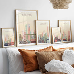 Collection of city skyline prints, including Singapore, London, Hong Kong, and Sydney, displayed on a modern wall.