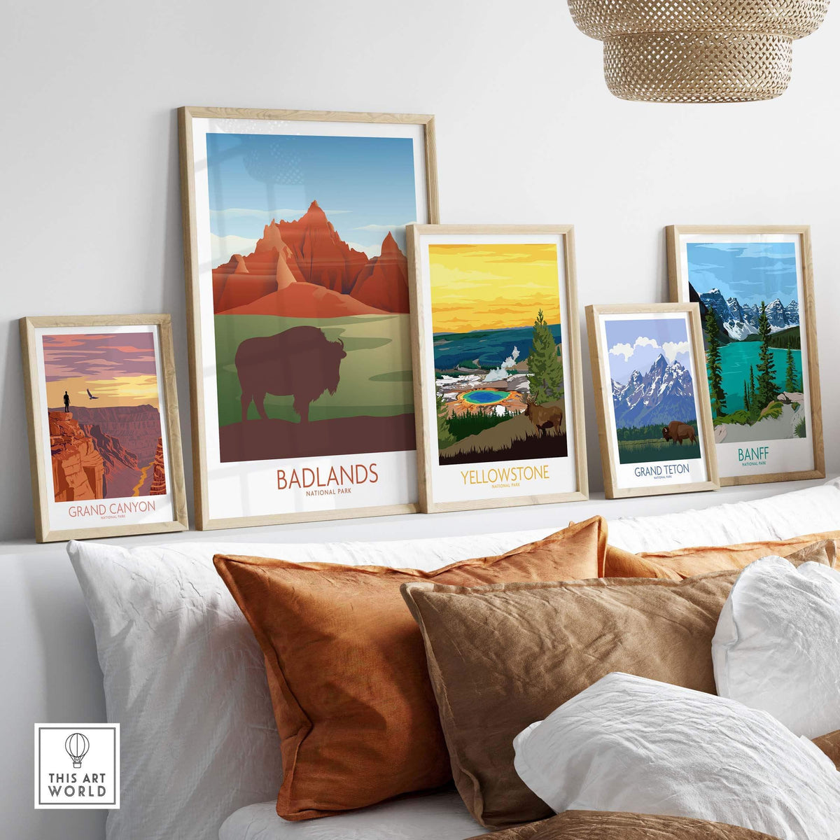 Gallery of framed national park art prints including Badlands, Yellowstone, Grand Canyon, and Banff.
