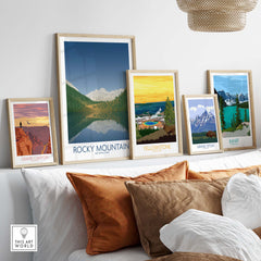 Rocky Mountain National Park art print displayed among framed national park posters in a cozy home setting.