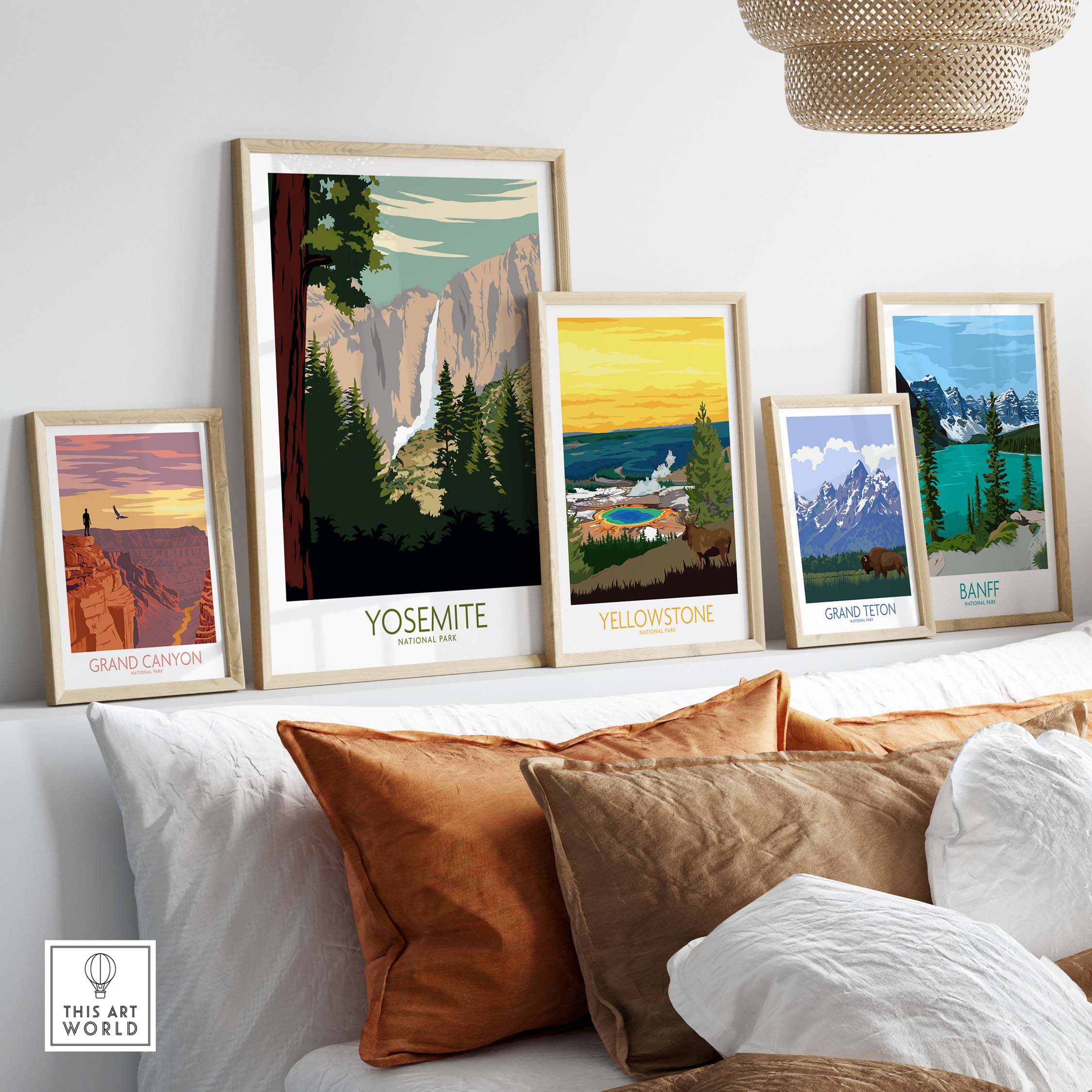 Framed Yosemite Park poster print among other vintage-style national park artworks in a stylish living room setting.