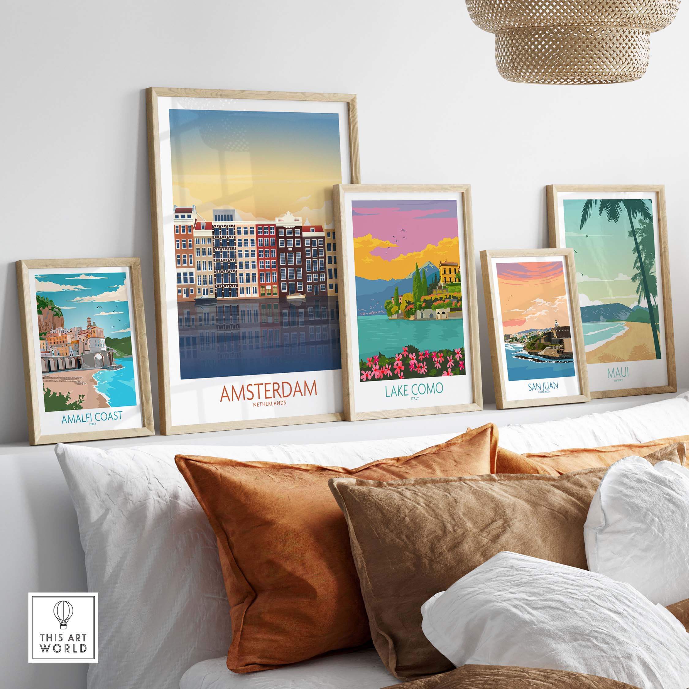 Amsterdam wall art print displayed with vintage-inspired travel posters on a cozy sofa.