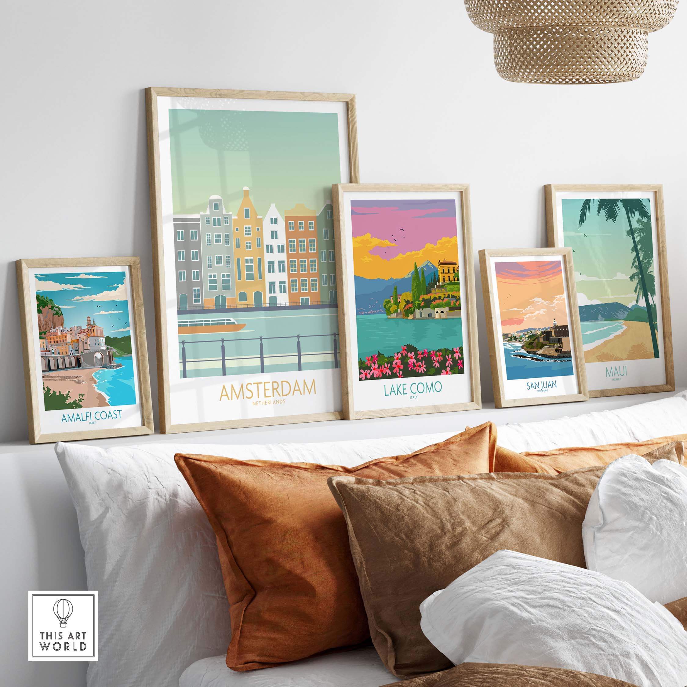 Framed Amsterdam print among vintage travel posters in a stylish living room, showcasing modern art inspiration.
