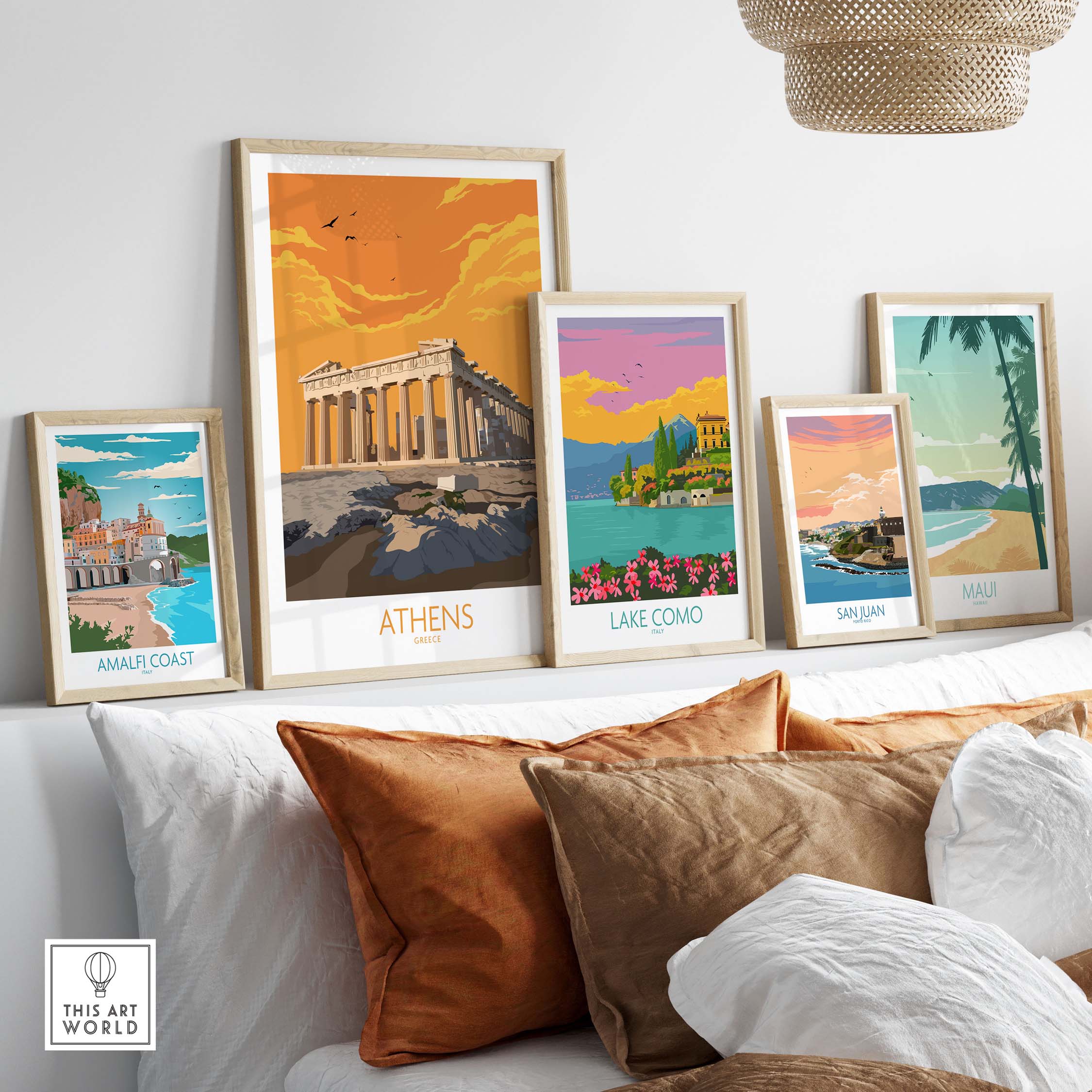 Athens poster and travel prints displayed on a shelf, showcasing vintage-style art of Greece and other destinations.