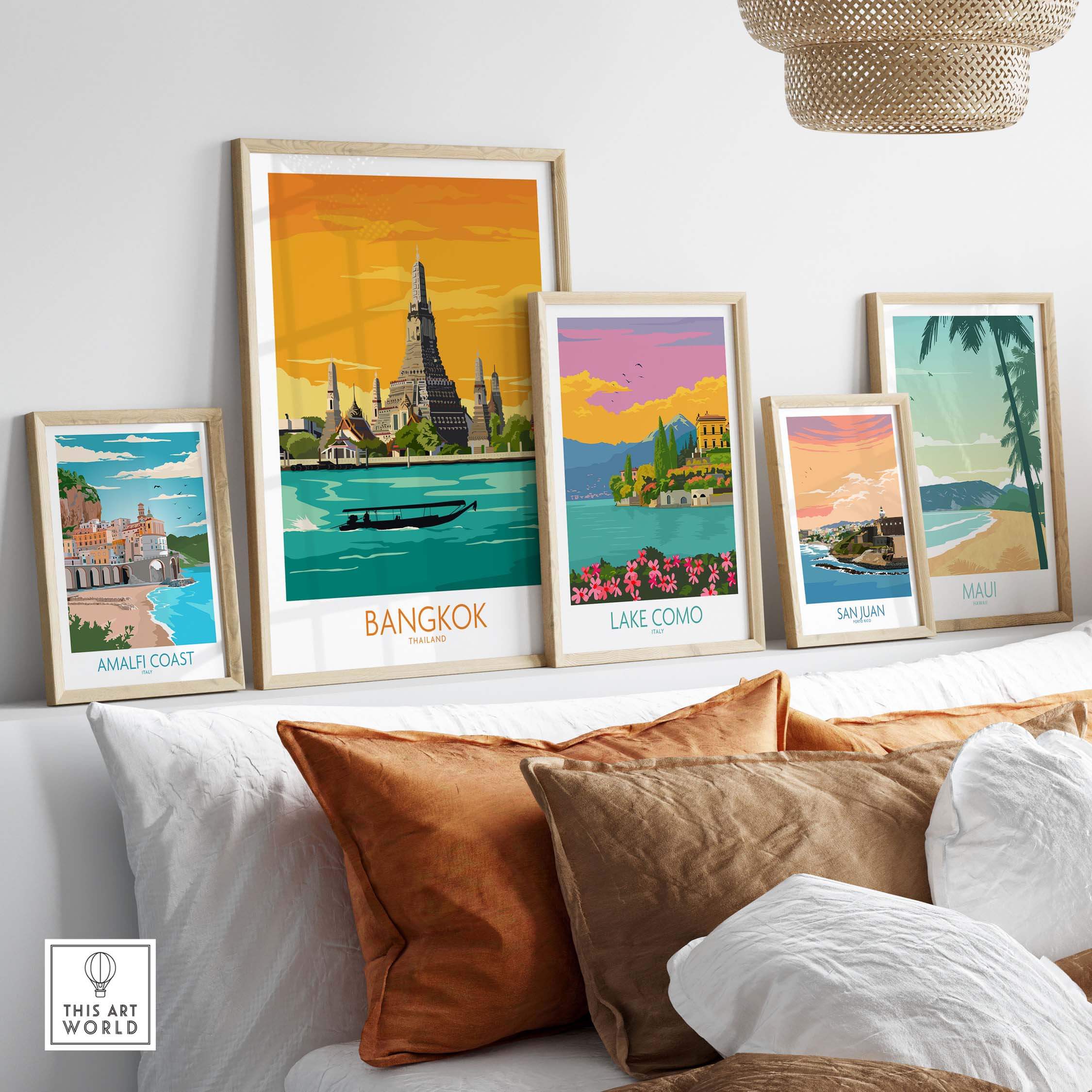 Colorful Bangkok travel poster displayed among other vintage travel prints in a modern home setting.